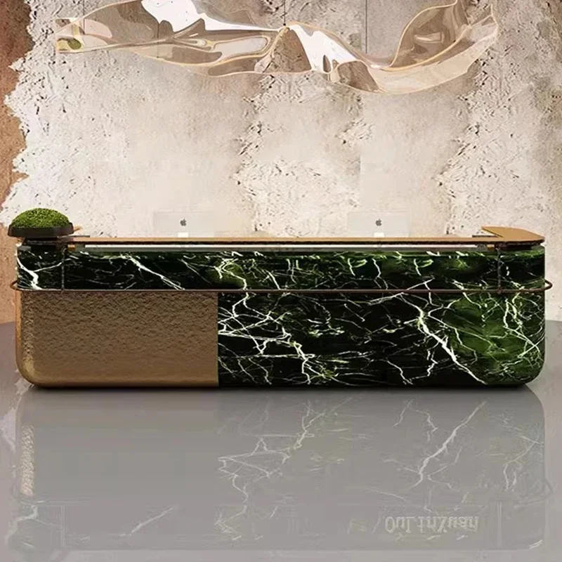 

Modern marble reception desk for beauty salon with cash register and bar counter.