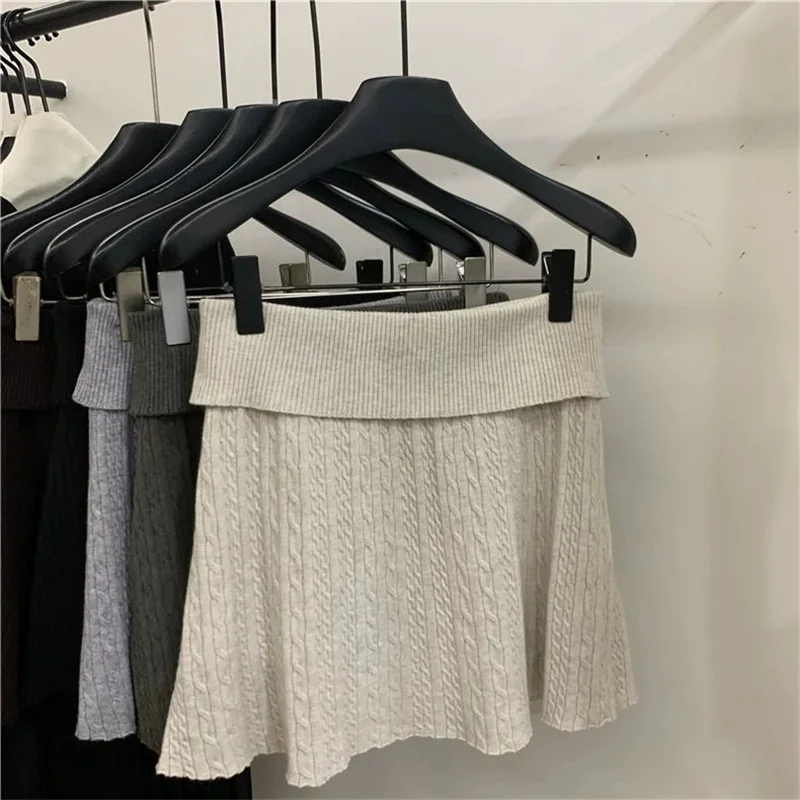 

Женская юбка, однотонная, простая, элегантная, короткая юбка, трикотажная трапециевидная юбка с высокой талией, корейская, черная, бежевая, сексуальная мини-юбка, плиссированная, осень-зима