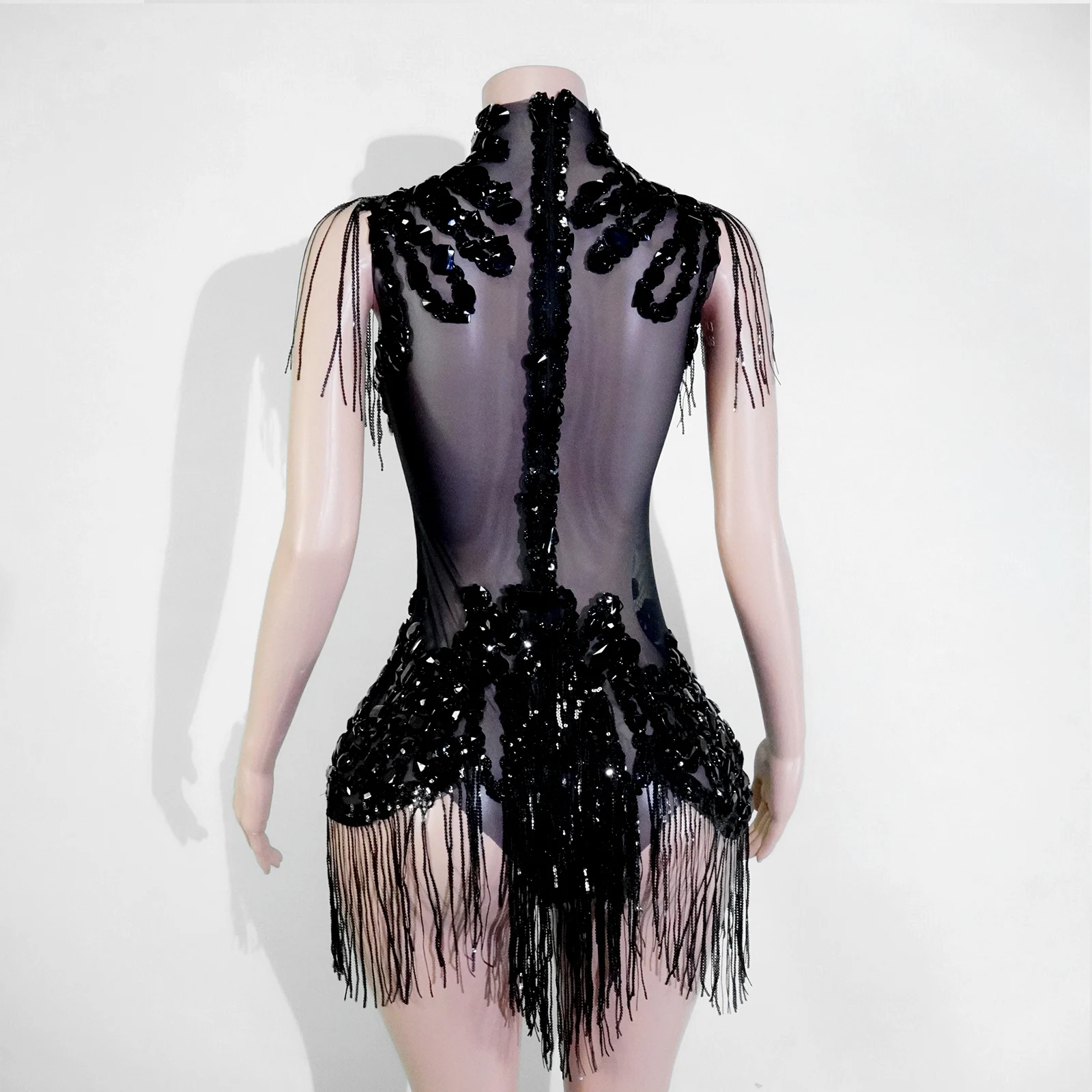 Nowy czarny kombinezon sceniczny bez rękawów z wysokim dekoltem, zdobiony frędzlami z czarnych cyrkonii, prześwitujący, idealny dla piosenkarzy, na imprezy, urodziny i do klubów nocnych.