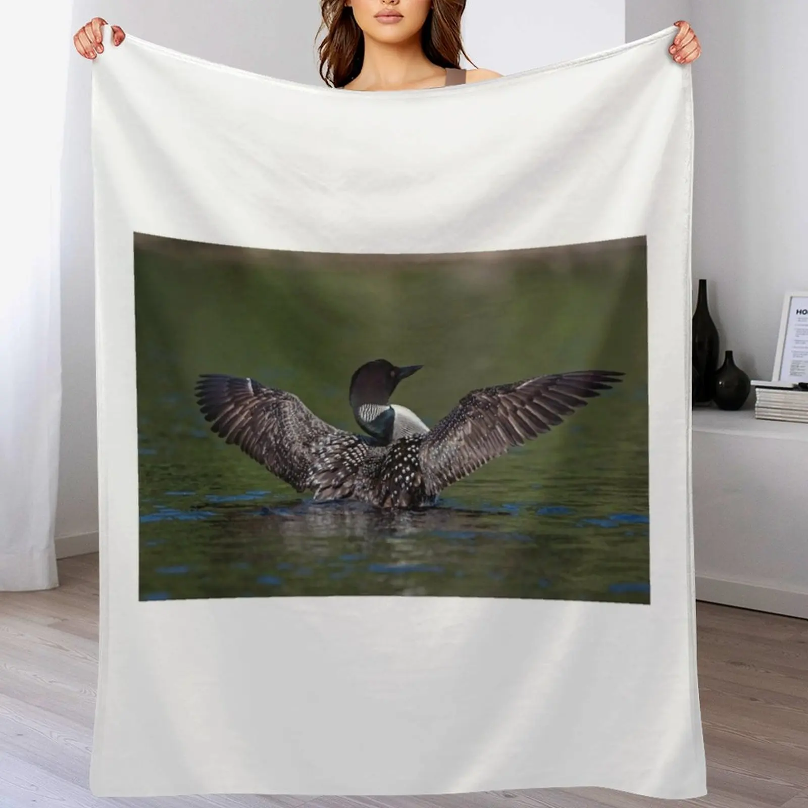 

Loon spreading it's wings Throw Blanket blankets and throws funny gift Nap Blankets