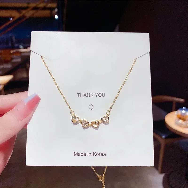 European and American fashion love zircon four-leaf clover necklace creative one two kinds of wearing magnet folding jewelry