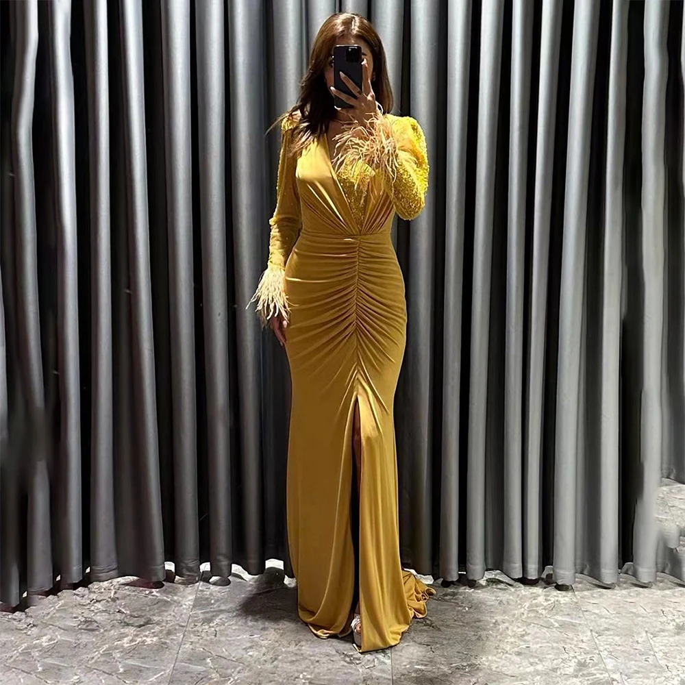 

Verngo Yellow Long Sleeves Party Dresses And Events V-neck Side Slit Sexy Evening Gown Feathers Pleat Mermaid Prom Gown Arabia