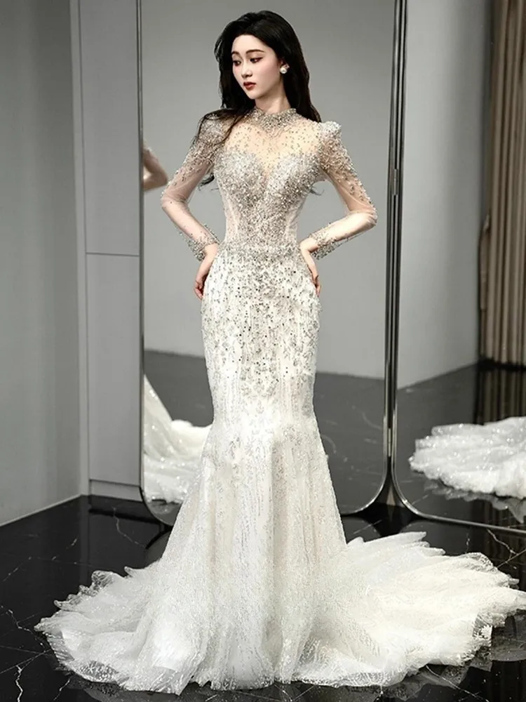 

A new fishtail light luxury long-sleeved main fabric heavy industry dress