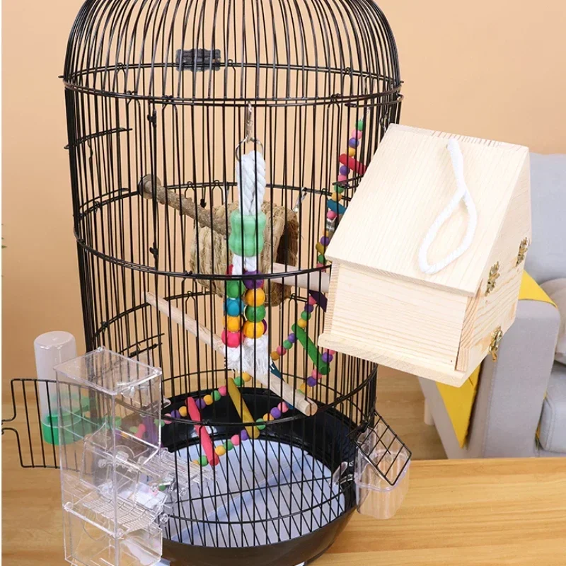 กรงนกแก้วเสริมขนาดใหญ่หรูหรารังโลหะกลมพร้อมถาดลิ้นชักเหมาะสําหรับการทําสําเนานกแก้วปลอดภัยกรงนกวิลล่า