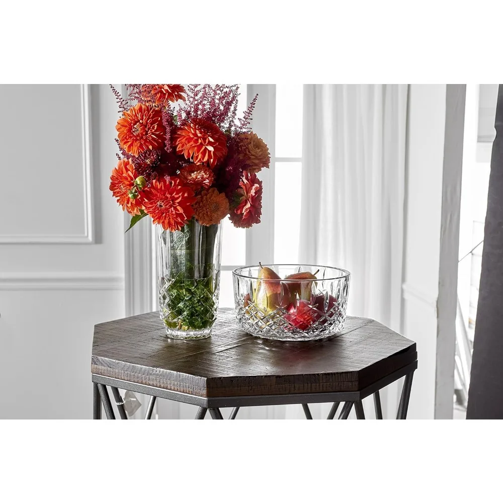 

Markham Vase, 9" 5"L x 5"W x 9"H Crafted from high quality crystalline, featuring a classic wedge cut