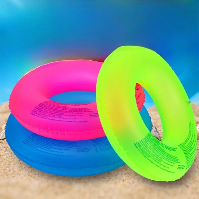 ฤดูร้อนสระว่ายน้ําเรืองแสง Inflatable ของเล่นว่ายน้ํากลางแจ้งแหวนสีสุ่มชายหาดว่ายน้ําลอยน้ําของเล่นสําหรับเด็กผู้ใหญ่