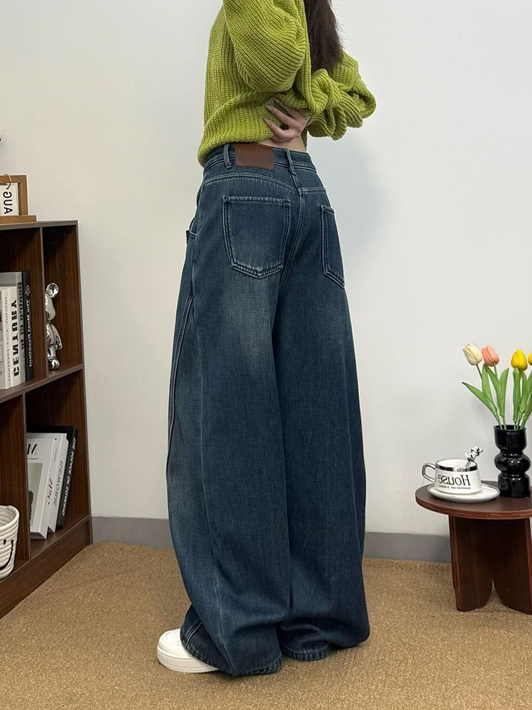 Calça jeans feminina de perna larga da moda americana de inverno com design de zíper inclinado