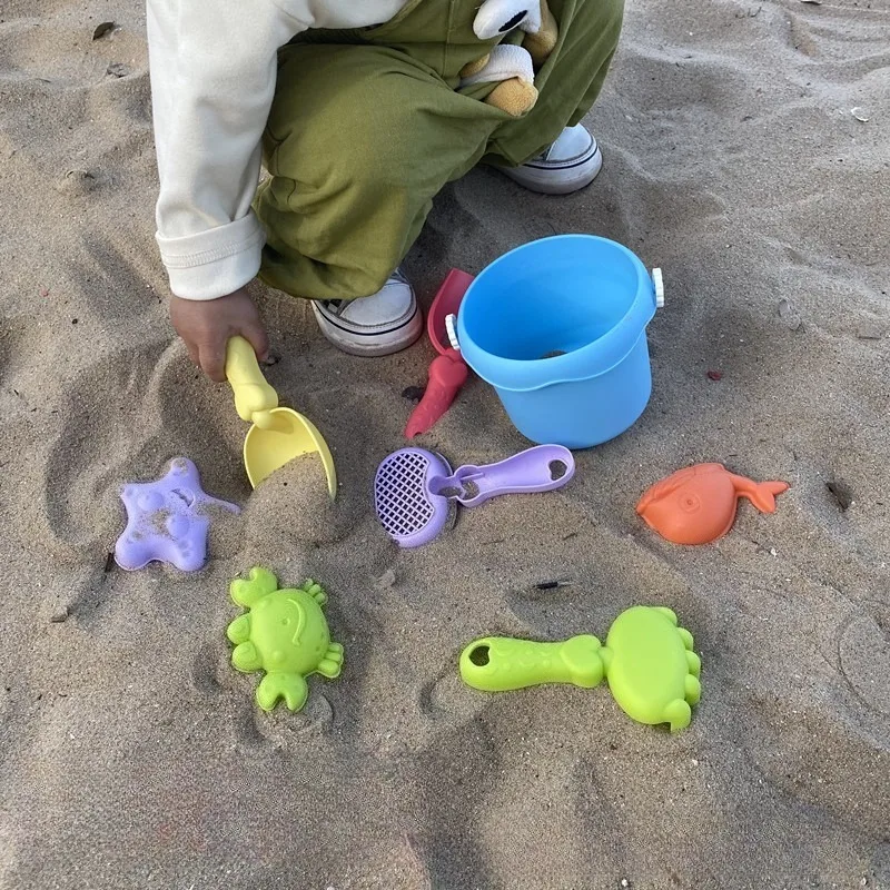 ของเล่นเด็กชายหาดชุดเล่นน้ําขุดทรายเด็กพลั่วตกปลาสุทธิขุดถังทรายเครื่องมือของเล่นริมทะเลอายุ 3 ปี