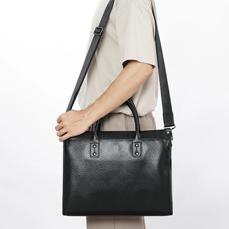 Valigetta da donna di design di lusso Borsa tote in pelle di mucca Borse a tracolla da uomo di alta qualità Borsa per laptop in pelle