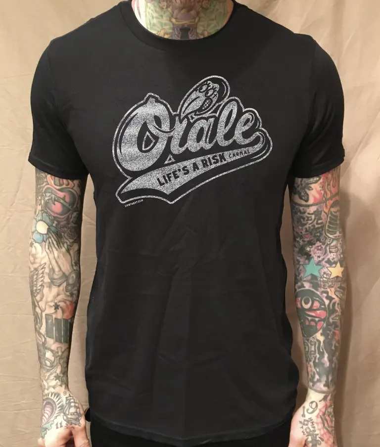 Orale Lifes A Risk Carnal on Black T Shirt