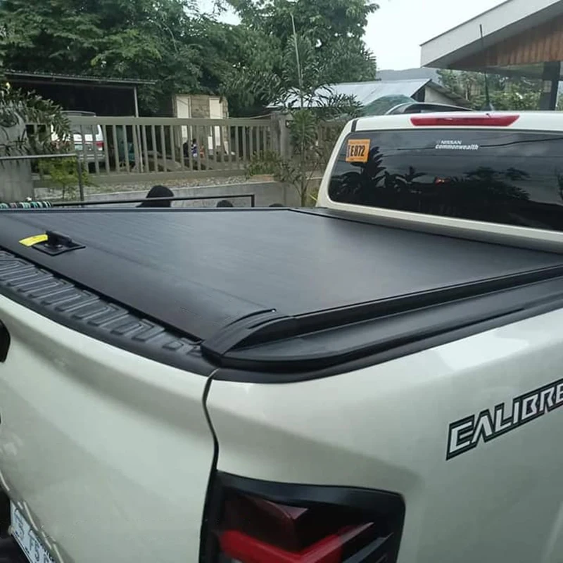 Pickup truck bed rear hardtop roller shutter lid tonneau cover for nissan navara np300 frontier d40 d22 d23 pro4x