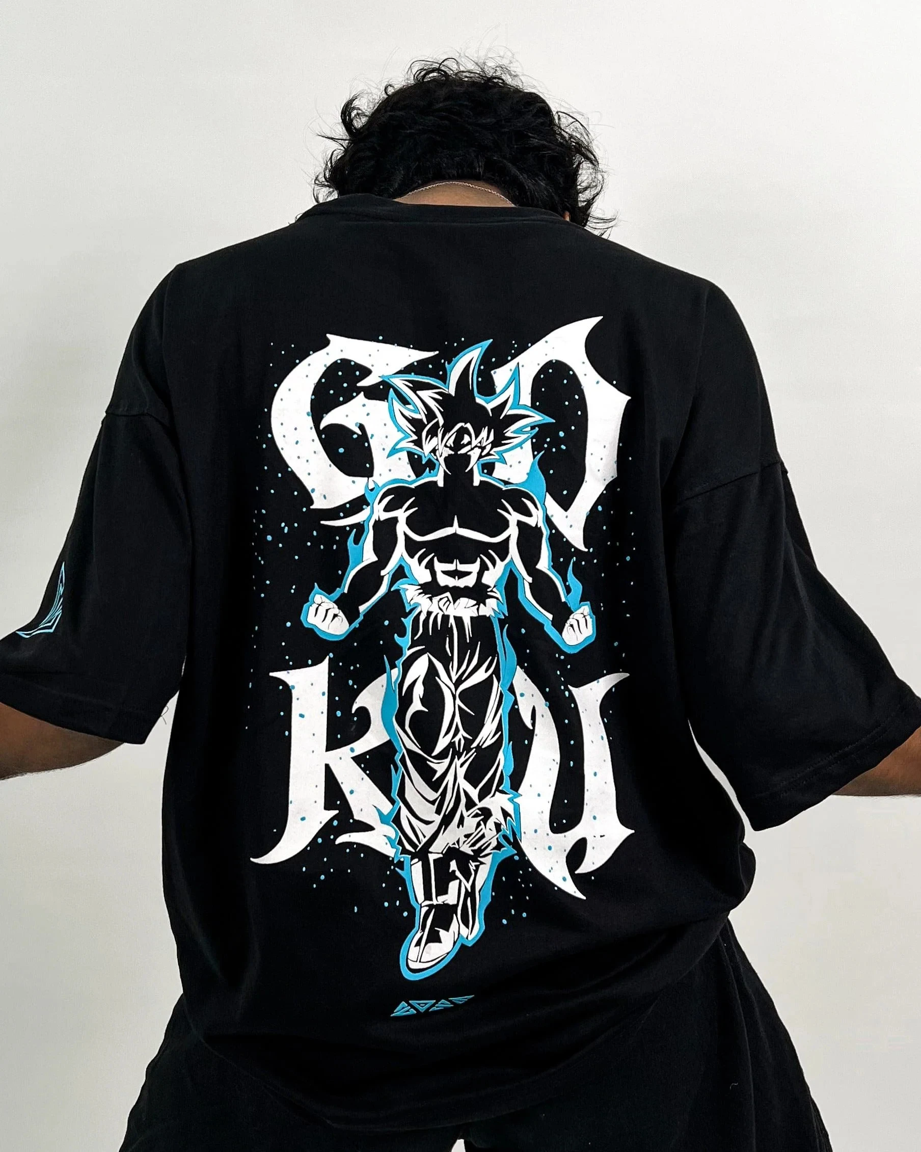 تي شيرت قطني فضفاض من Dragon Ball Z Goku للرجال 2025 ملابس صيفية مطبوعة باللون الأسود ملابس صيفية غير رسمية