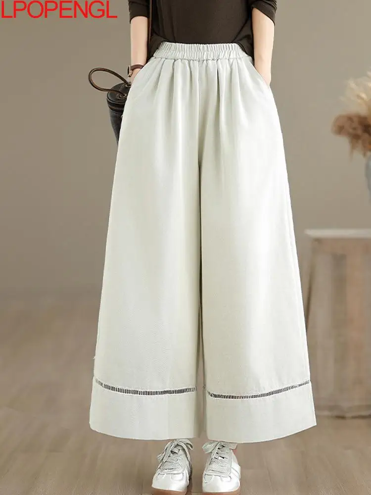 Modne spodnie jeansowe z szerokimi nogawkami w jednolitym kolorze, w stylu retro patchwork, damskie, jesienno-zimowe, luźne, uniwersalne, z elastyczną talią, proste.