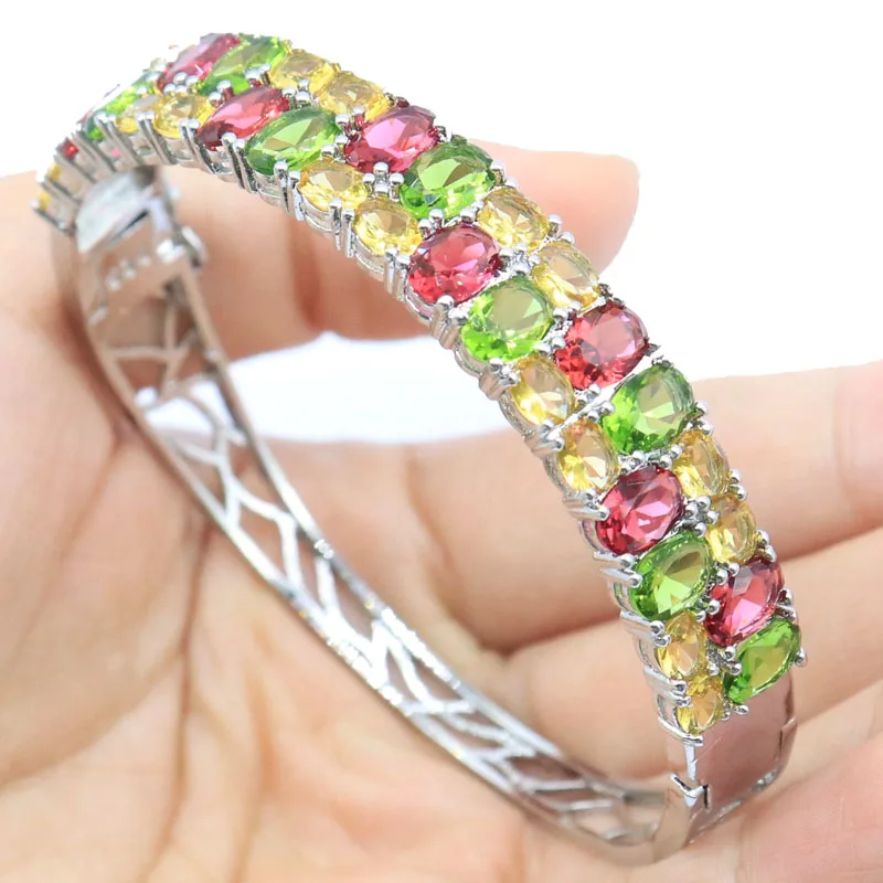 

Buy 7 Get 1 Free 65x12mm Beautiful Red Ruby Green Tsavorite Garnet Swiss Blue Topaz Kunzite Women Silver Bangle Bracelet 7.5inch