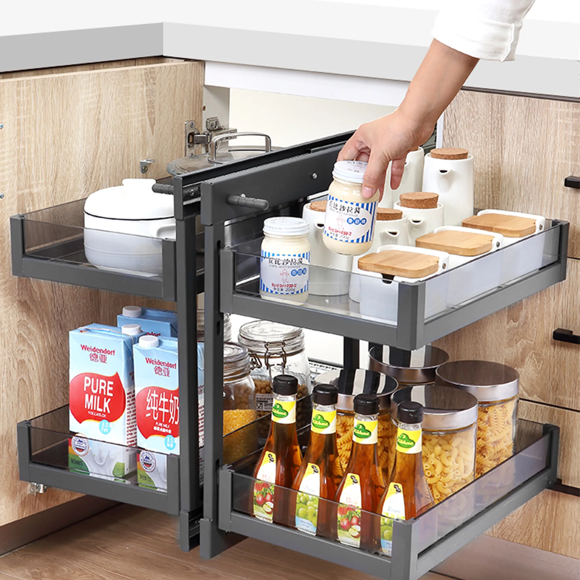 The kitchen features a rotating double-layer drawer design and a corner pull-out storage basket.