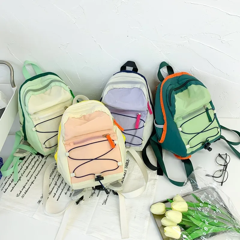 Children's color matching backpack draw rope light nylon elementary school bag outdoor mountaineering backpack