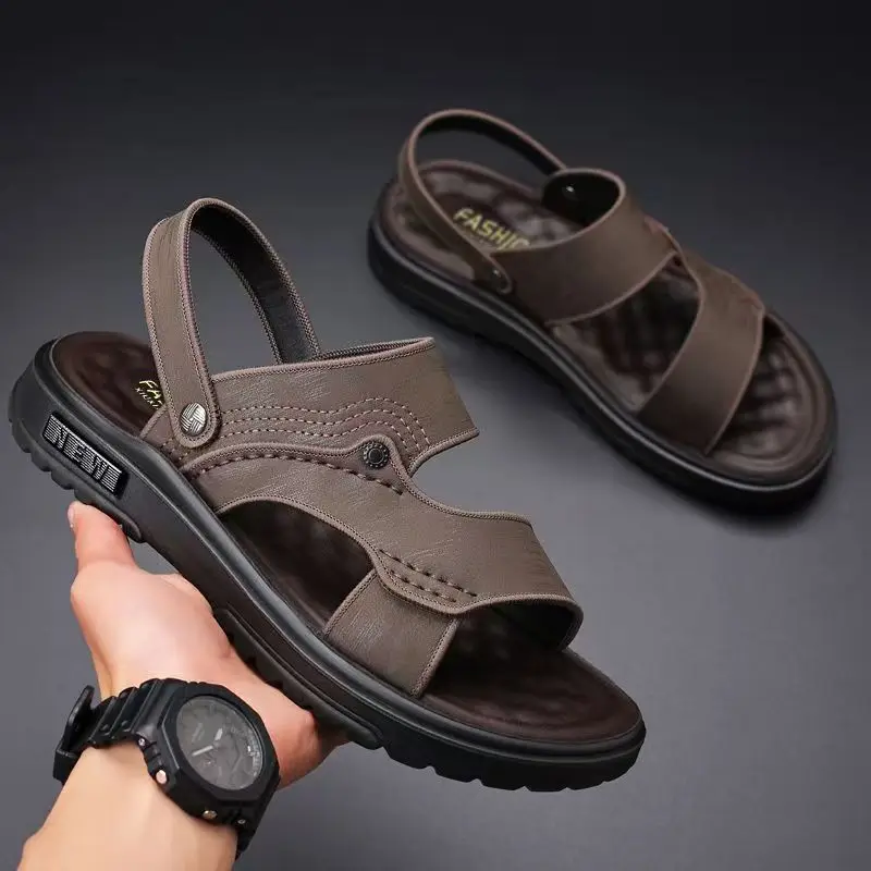 

Новые летние мужские кожаные сандалии большого размера на плоской подошве с открытым носком, мягкая подошва, нескользящие уличные пляжные сандалии двойного назначения, тапочки