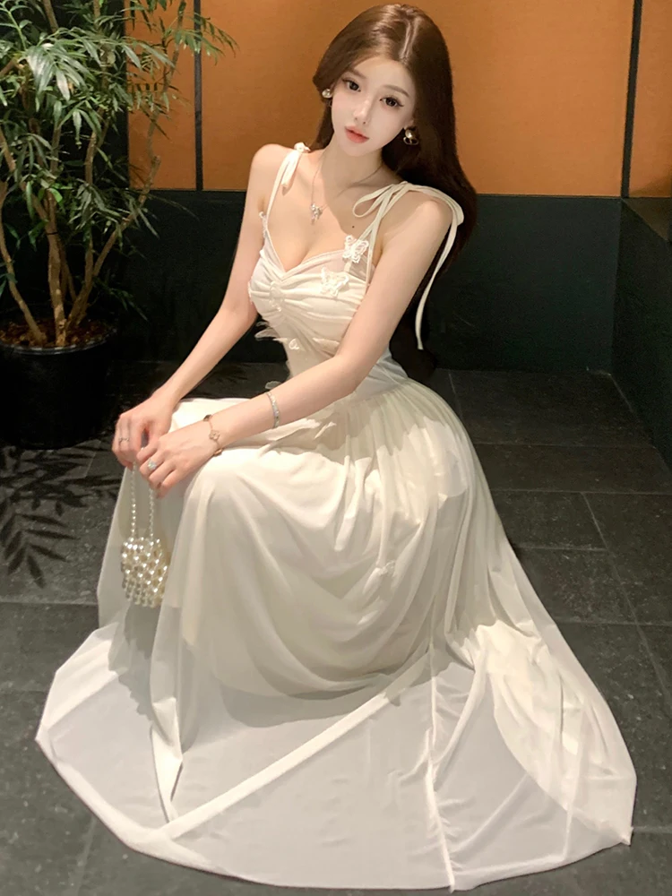 ชุดเดรสผ้าตาข่ายสีขาว แต่งโบว์เก๋ เซ็กซี่ สำหรับผู้หญิง ฤดูร้อน หรูหรา สง่างาม เหมาะสำหรับงานเต้นรำ ปาร์ตี้ ปี 2025 สไตล์เกาหลี วินเทจ ทรงเข้ารูป ชุดราตรี