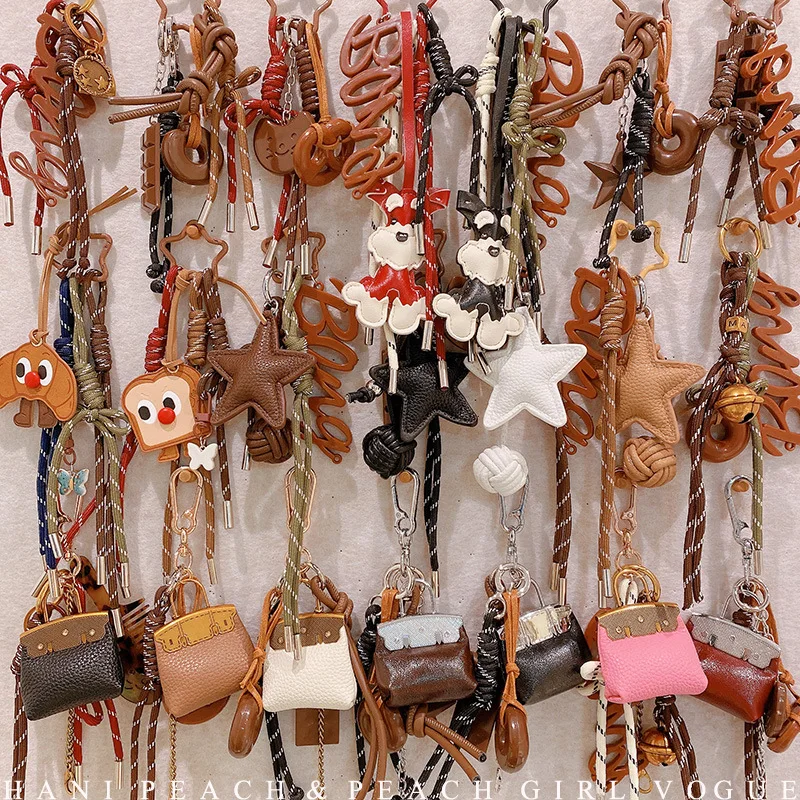 HD12123 Chocolate alkaline water bagel car keychain collection! Creative niche woven rope bag pendant