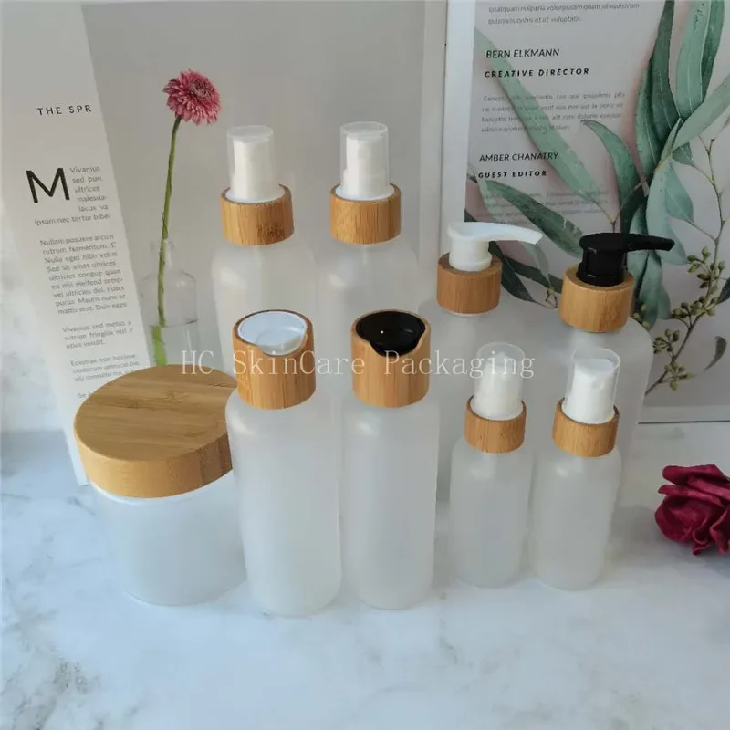 

Natural eco Bamboo Lid Plastic Frosted Lotion Bottles with bamboo toner Pump eco friendly bamboo cosmetic glass spray bottle
