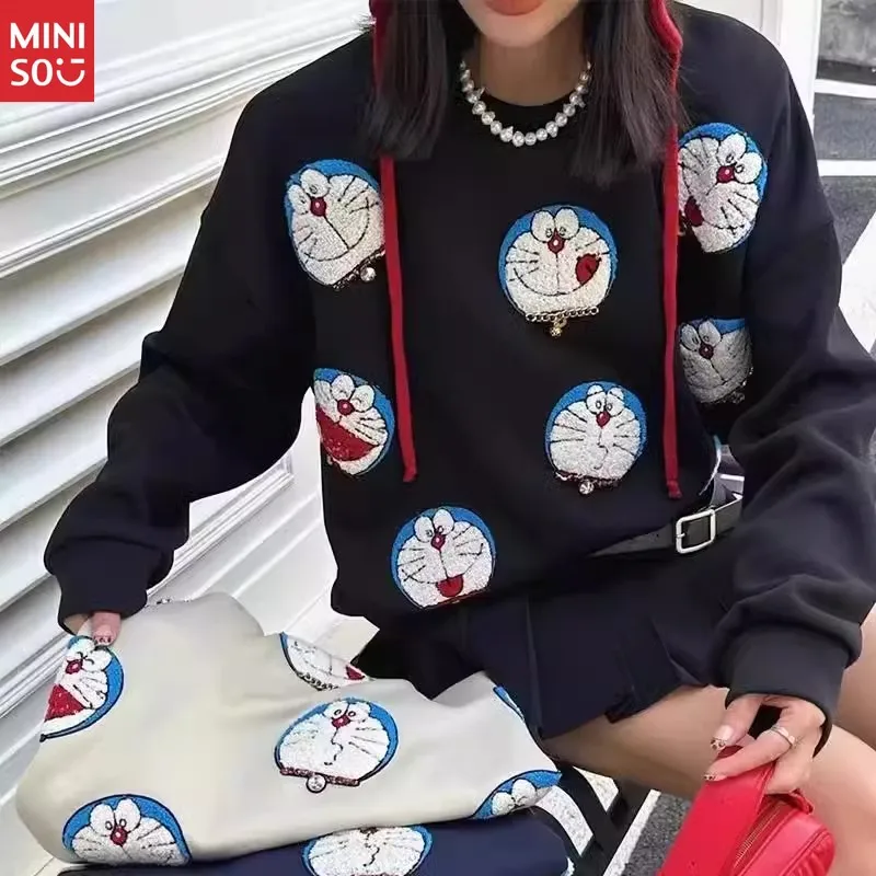 

Miniso Oversized Women's Embroidered Pullover | Cute Doraemon Design for Curvy Figures