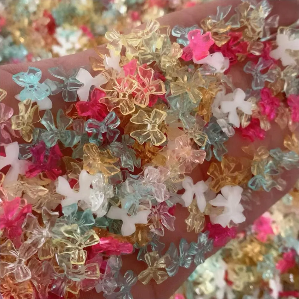 50 그램/가방 오로라 리본 Bowknot 네일 매력 500-600pcs 손톱에 혼합 된 3D 수지 활 쥬얼리 프레스 귀여운 요정 Bowknot 매니큐어 부품