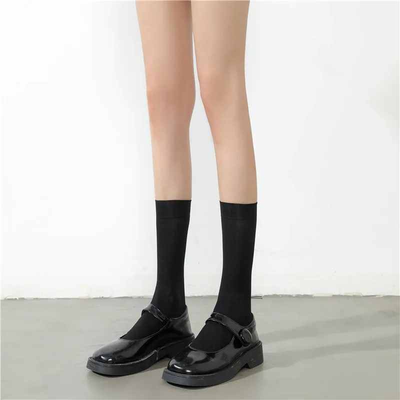 Bas sexy sur le mollet pour femmes, bas de documents solides, chaussettes longues noires et blanches, chaussettes cosplay Lolita JK, bonneterie pour femmes, bas de cuisse