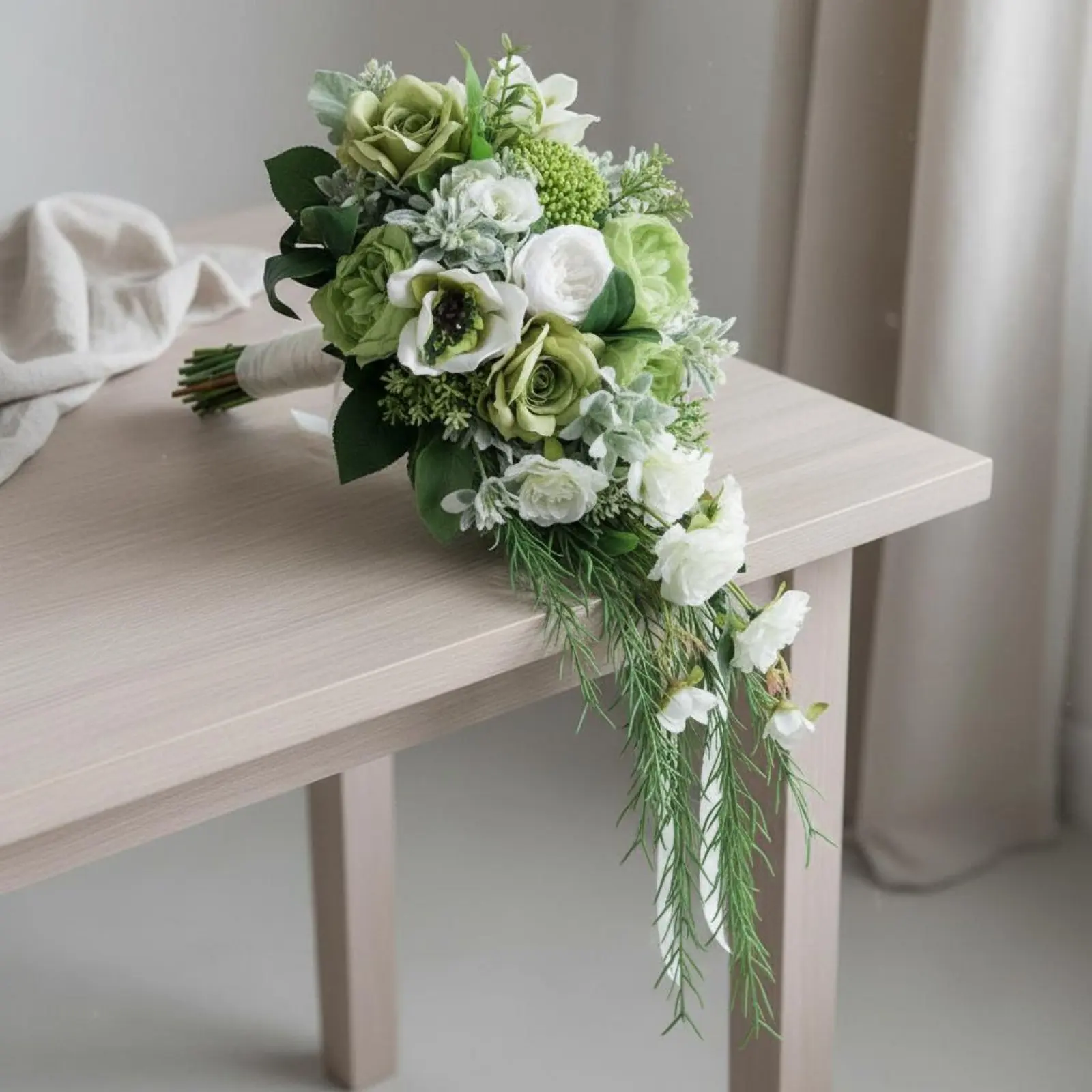 artificial-teardrop-floral-arrangement-realistic-look-cascading-ceremony-flowers-green-and-white-bridal-flowers-real-feel