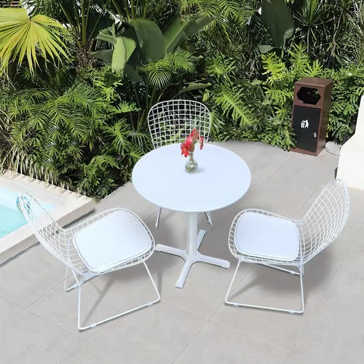 Balcony meeting table and chair combination milk tea coffee outdoor wrought iron backrest hollow chair