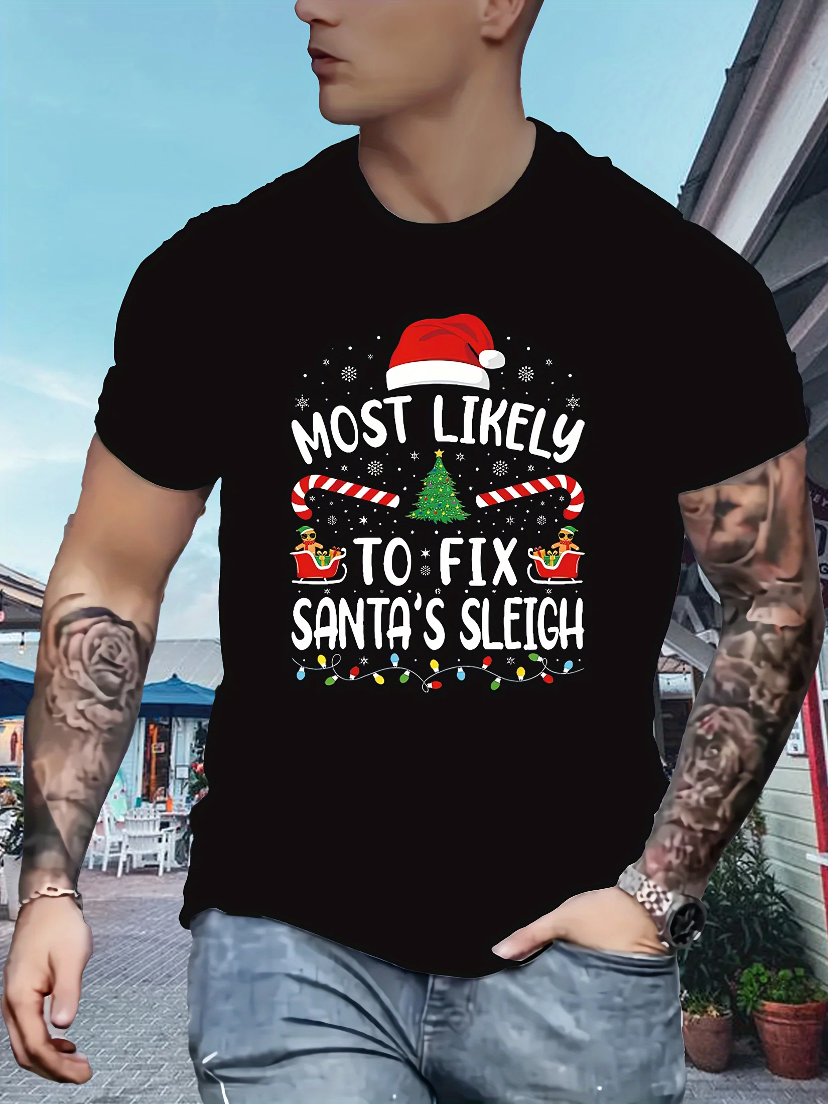 Camiseta masculina divertida de Natal – Camiseta com padrão de trenó de Papai Noel com texto "Most Likely to Restore Santa's Sligh" - Blac