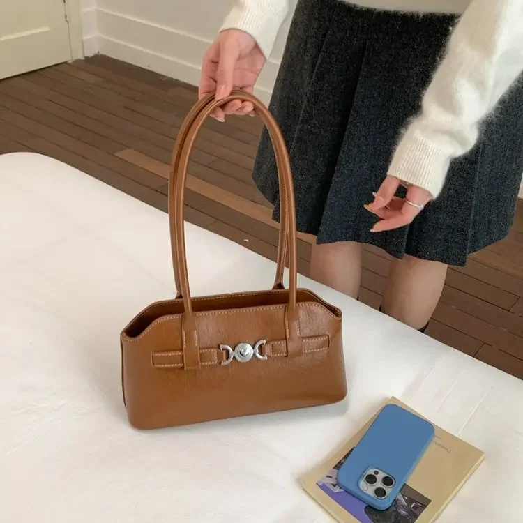 

Ретро-сумка женская на плечо большой вместимости 2026: модная корейская сумка-багет с текстурой премиум-класса для женщин