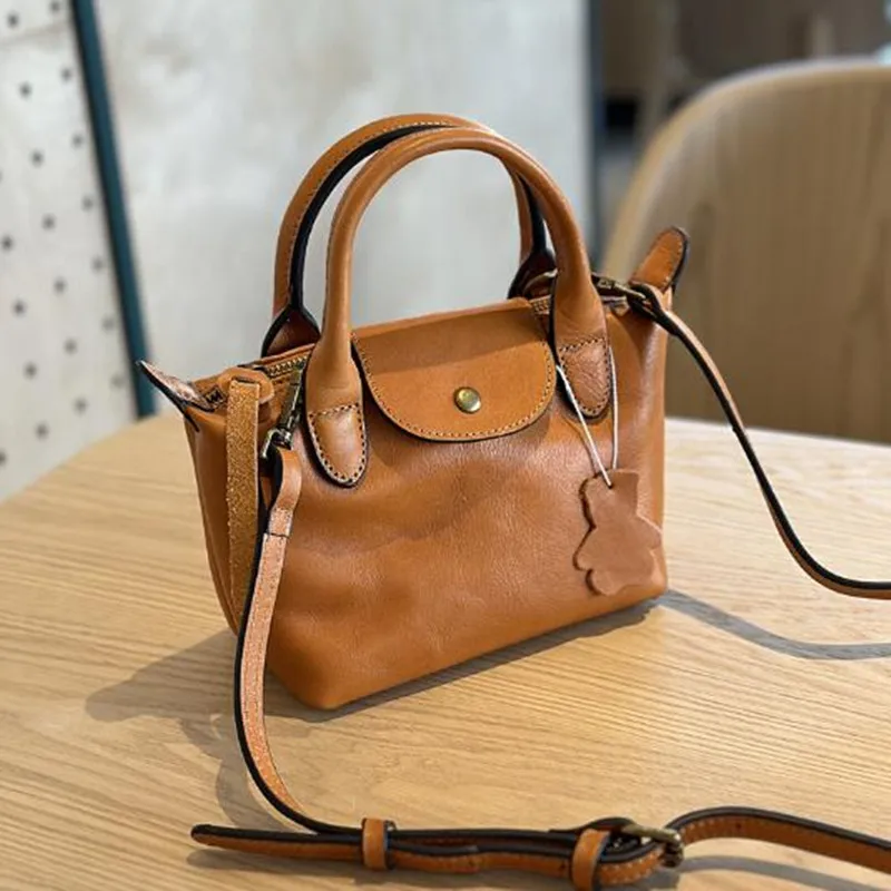 2025 Spring/Summer vegetable tanned cow leather women's Bag Hand Bill Shoulder Bag Leather casual fashion mini crossbody bag