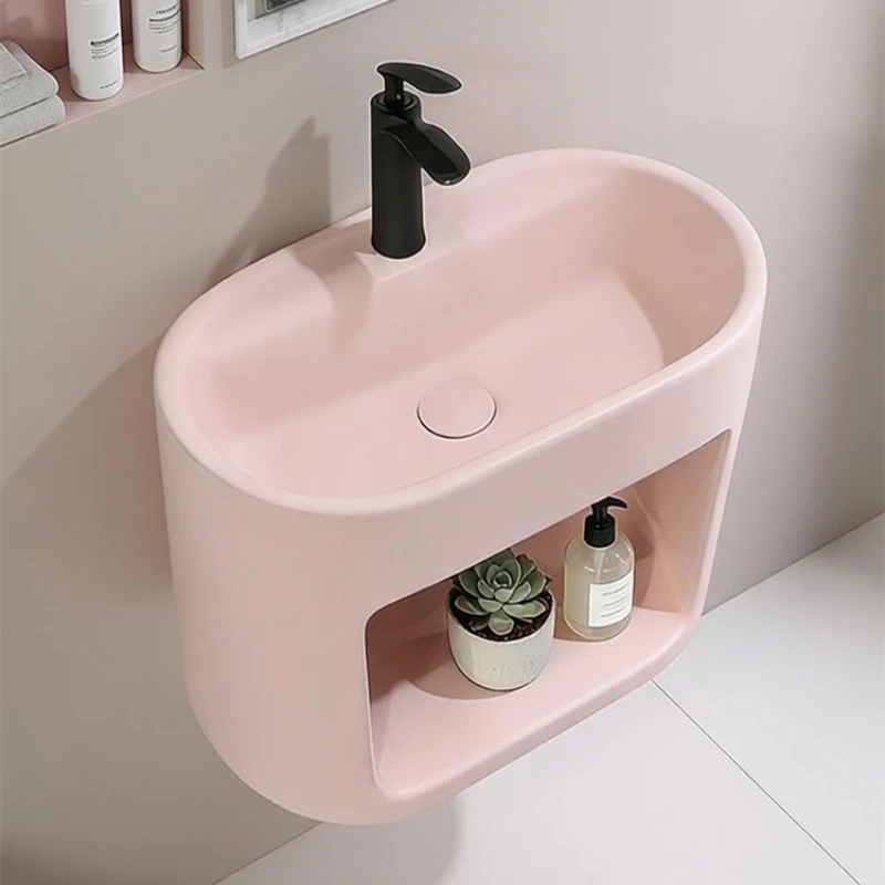 Pink wall-mounted oval ceramic wash basin Small apartment bathroom Household B & B inn Washbasin Single basin