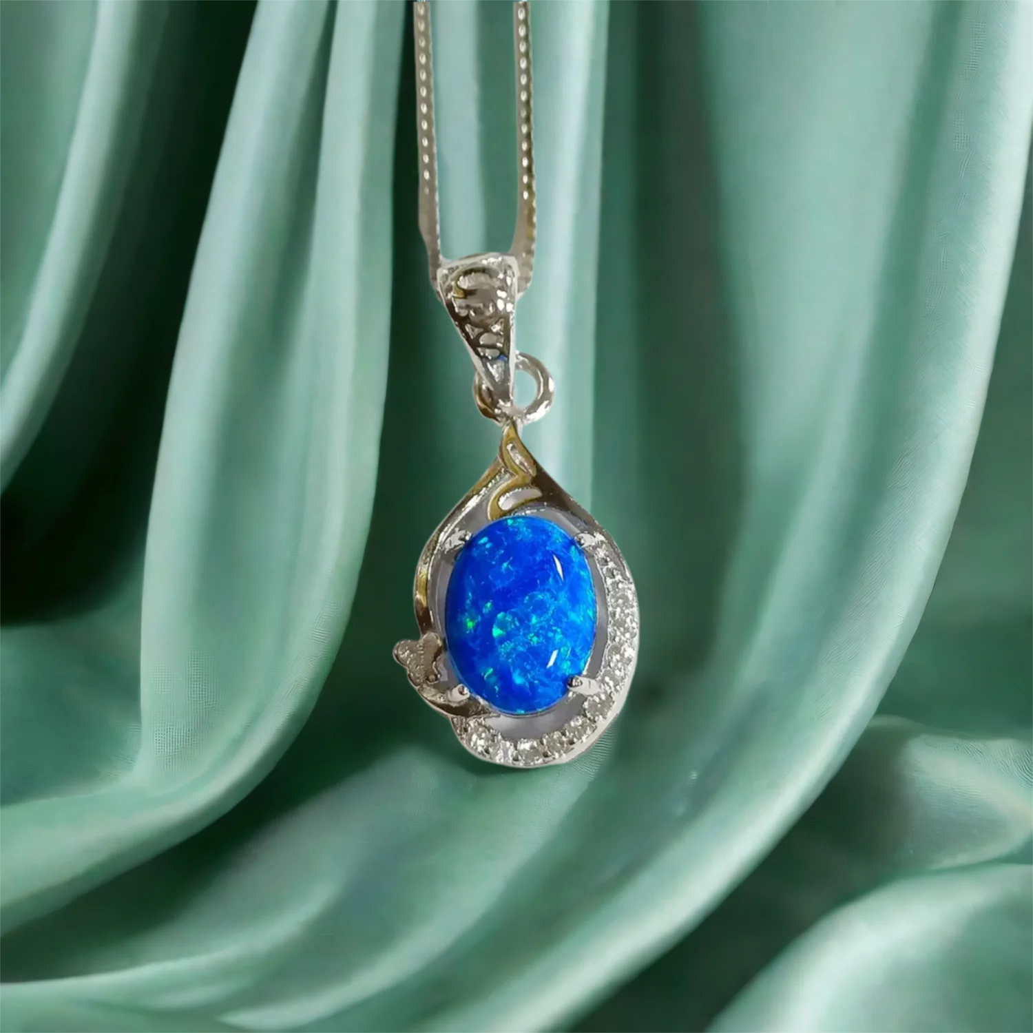 

Nature Inspired Butterfly Oval Cut Pendant for Ladies Necklace 925 Silver Blue Fire Opal Pendant