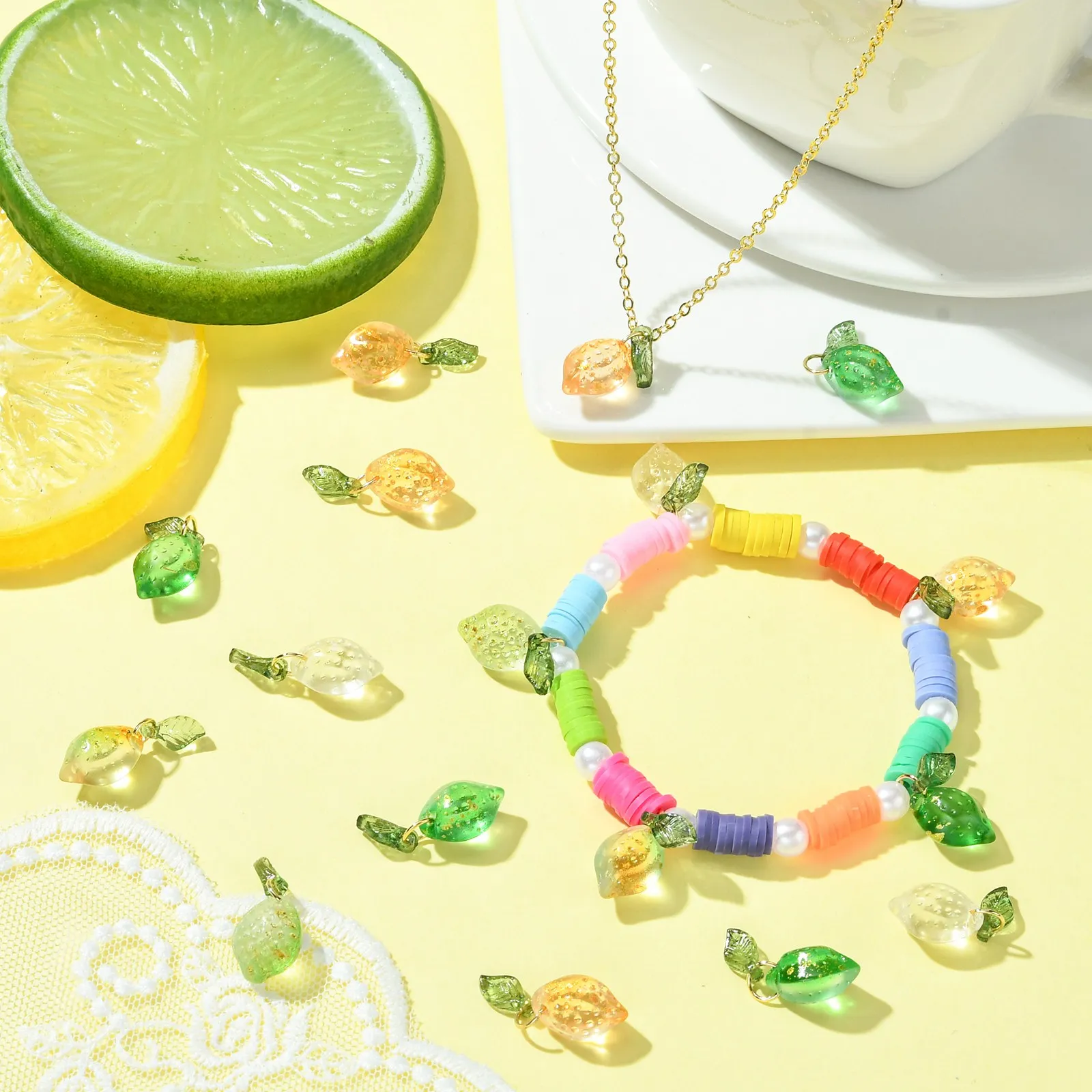 Pandahall 50Pcs 5 Colors Lampwork Fruit Charms Glass Crystal Lemon Charms Imitation Food Dangle Pendant for Jewelry Making