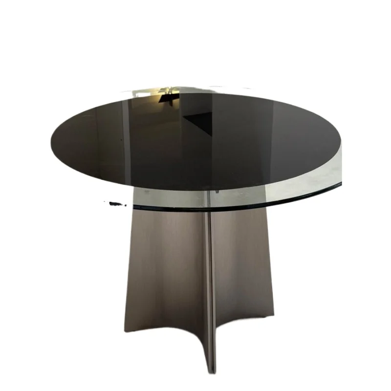 

Italian modern simple tempered glass dining table designer medium and ancient style restaurant home high-end sense round