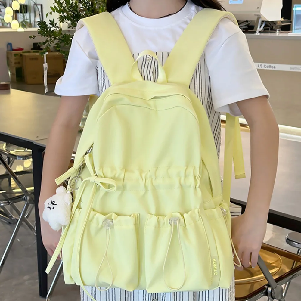 ใหม่กันน้ําเด็กโรงเรียนกระเป๋าเป้สะพายหลังไนลอนความจุขนาดใหญ่นักเรียนกระเป๋านักเรียนน้ําหนักเบากวดวิชากระเป๋าโรงเรียนสํานักงาน