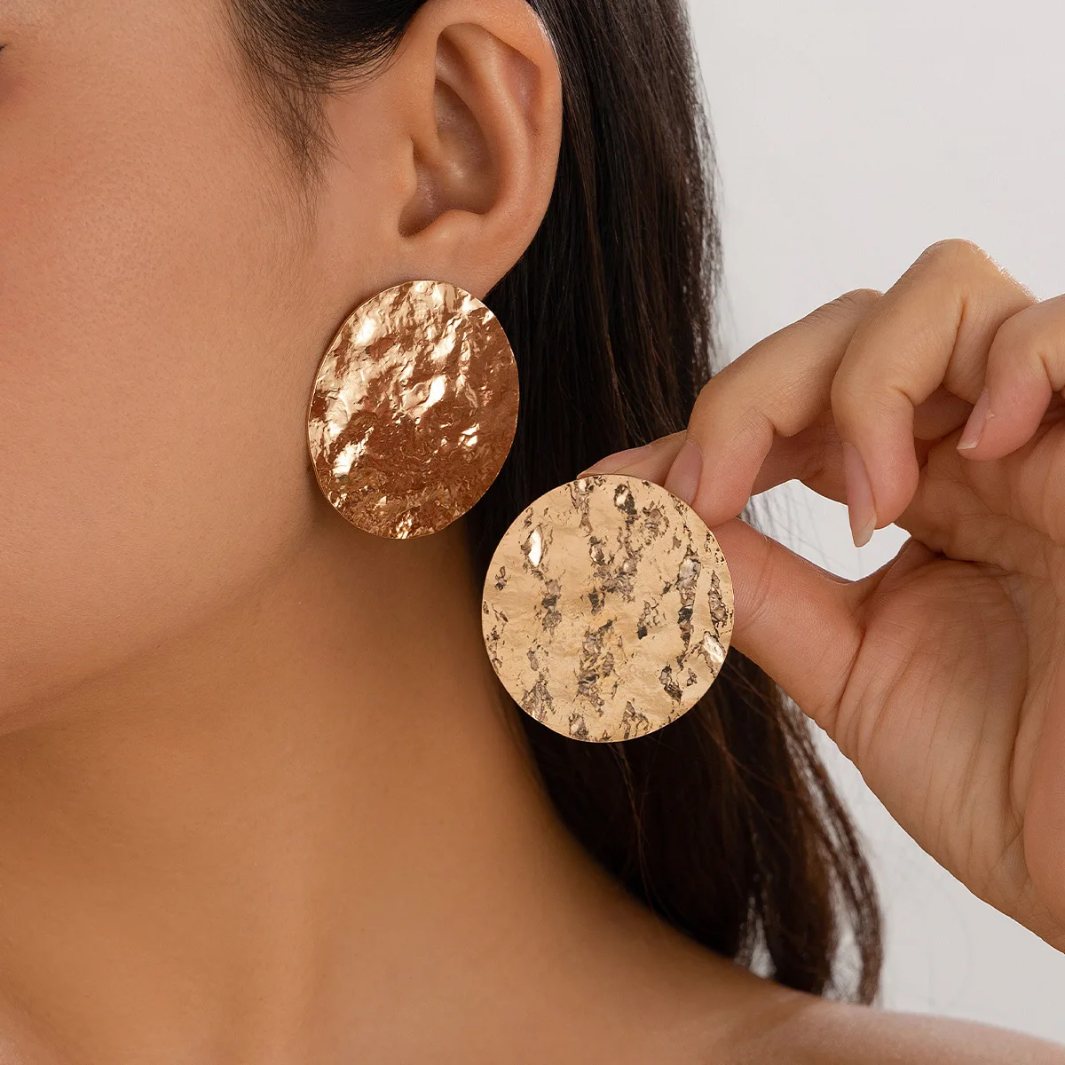 Jewelry exaggerated corrugated pockmarked round stud earrings, simple ins pleated metal earrings