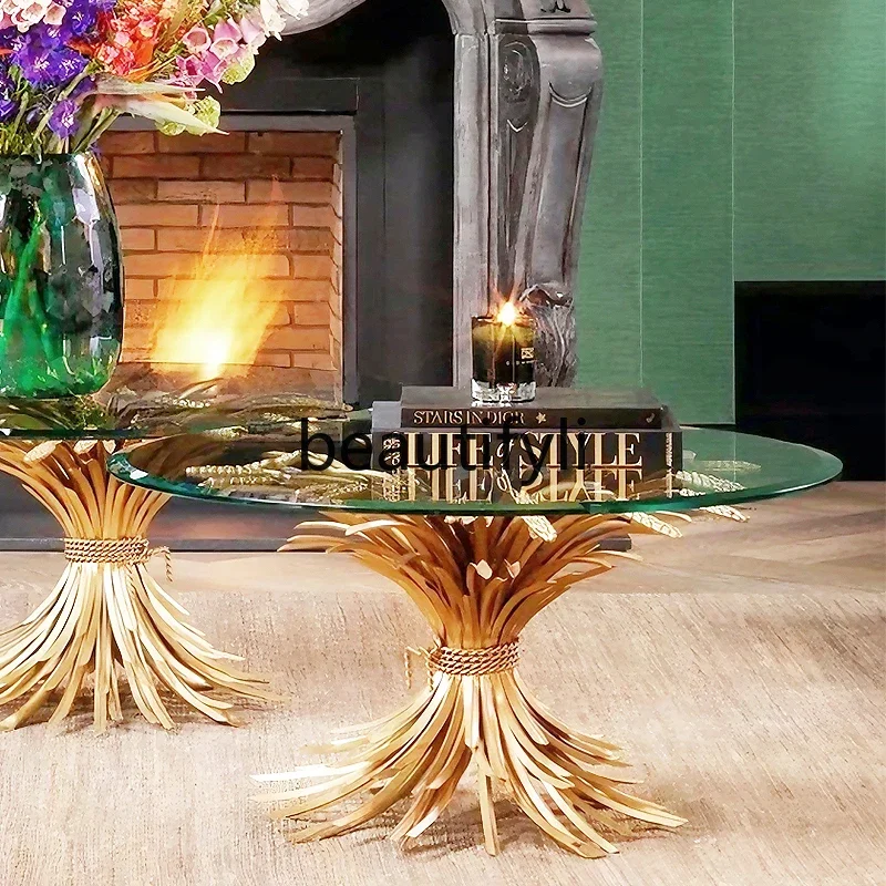 

Italian light luxury glass dining table modern art creative living room household stainless steel rice ears round dining table