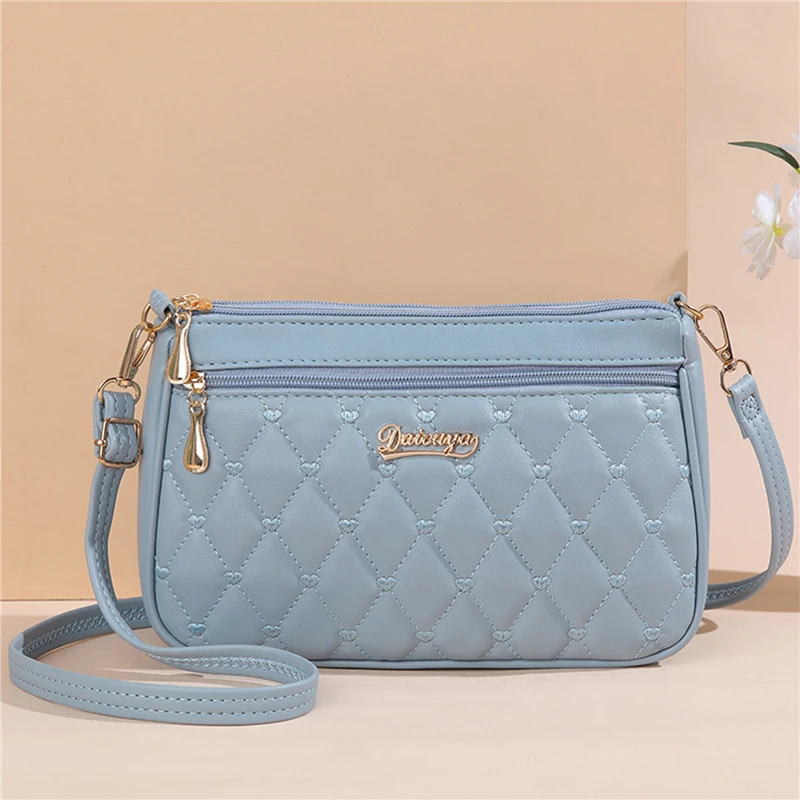 Bolso cruzado de cuero PU con cremallera para mujer, bandolera pequeña de gran capacidad con hilo de bordar, a la moda, novedad