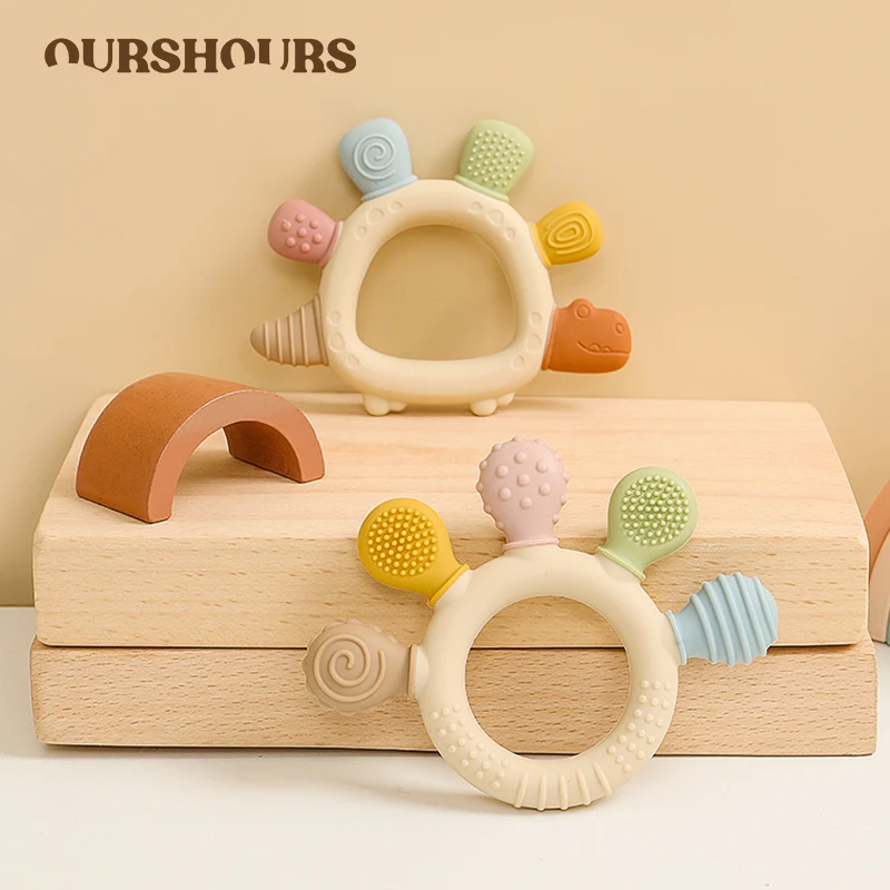 

Силиконовые детские прорезыватели без BPA, мультяшный динозавр, детские жевательные игрушки для прорезывания зубов для мальчиков и девочек, легко захватывающиеся прорезыватели для ухода за младенцами