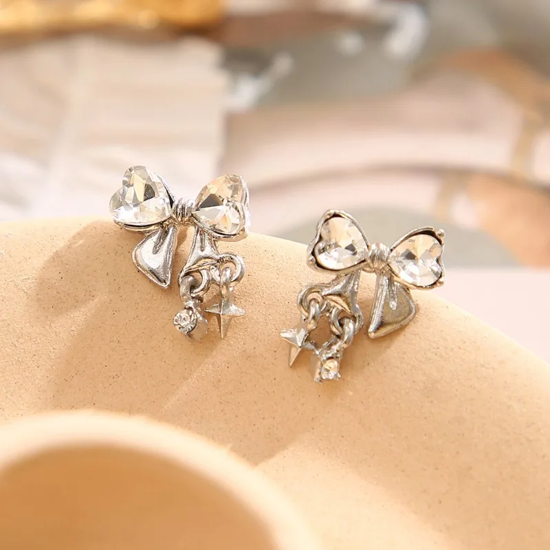 

New Mangxing zircon bow stud earrings temperament ins wind light luxury high-end ear studs wholesale women