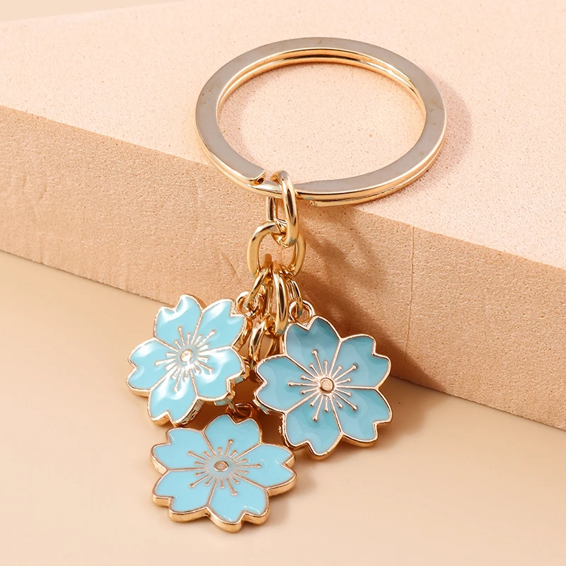 Aihua 40 Farben Niedlicher Pflanzen-Schlüsselanhänger Emaille Sakura-Blumen-Schlüsselanhänger für Frauen Mädchen Handtasche Anhänger Autoschlüsselhalter DIY Schmuck Geschenke – Detail 20
