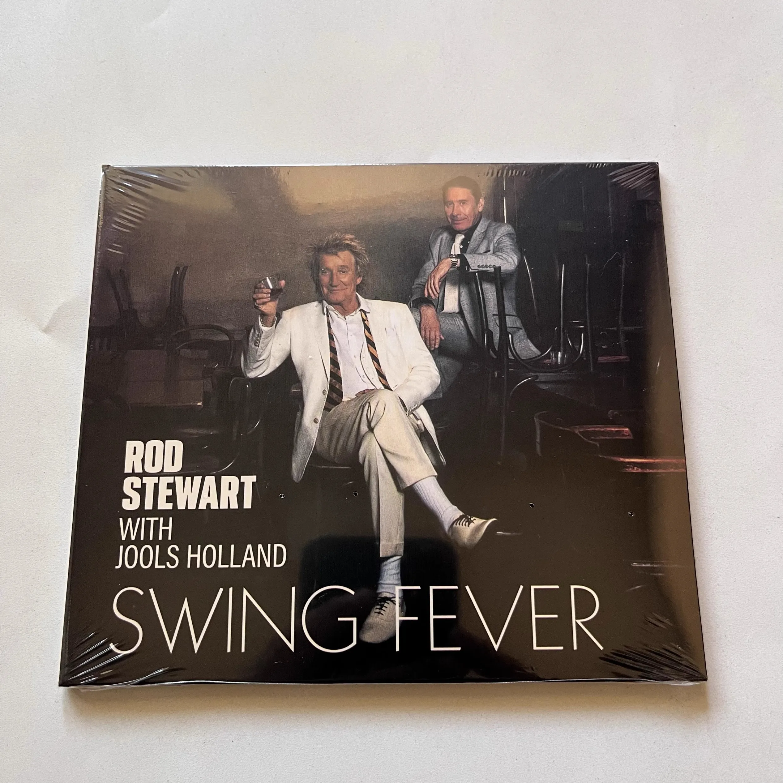 Nuevo Rod Stewart Jools Holland música CD Swing Fever álbum grabación de música Cosplay Walkman coche trampas de sonido caja fiesta colección de música