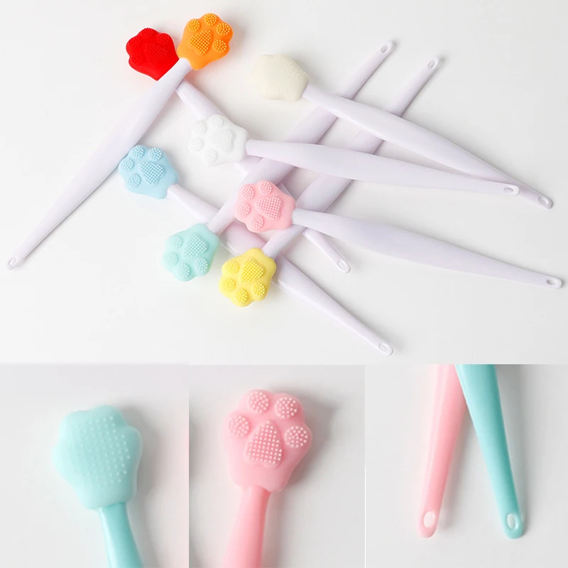 Szczoteczka silikonowa do mycia twarzy z dwustronnym użyciem w kształcie kociej łapki, złuszczająca, do czyszczenia nosa i usuwania zaskórników, z wymiennymi główkami.