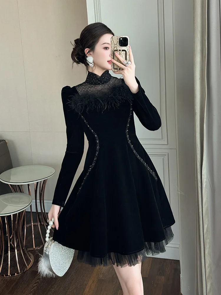 Lente nieuwe dames Franse opstaande kraag taille afslankende zwarte onregelmatige fluwelen jurk