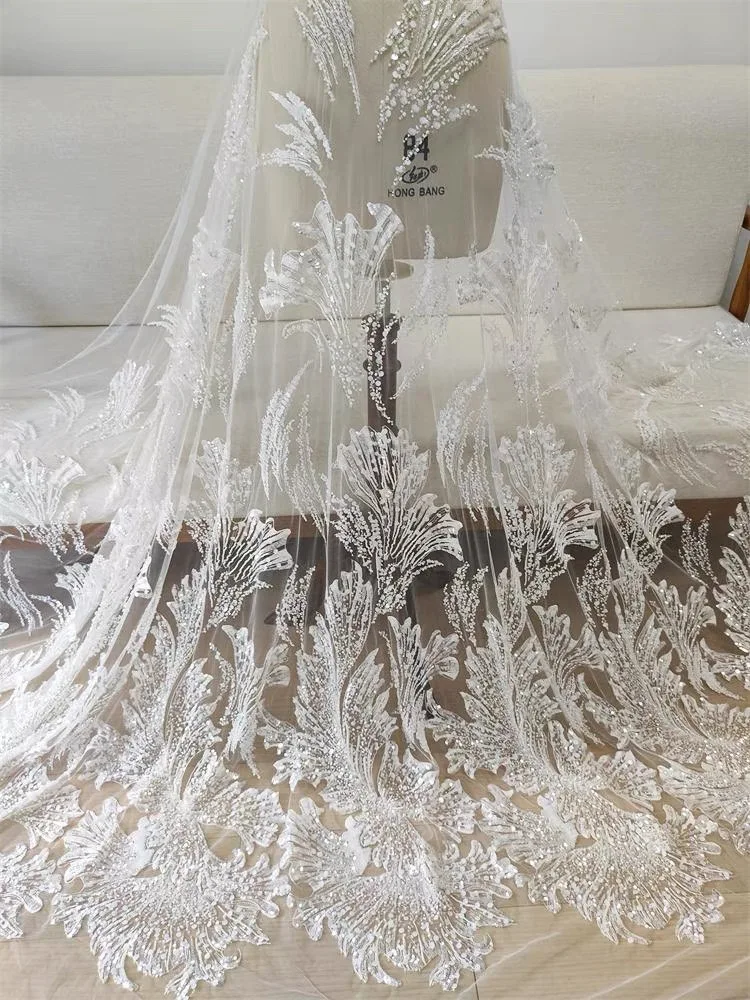 

Unique flower lace wedding dress with beads and sequins fabric width 135cm sold by yard