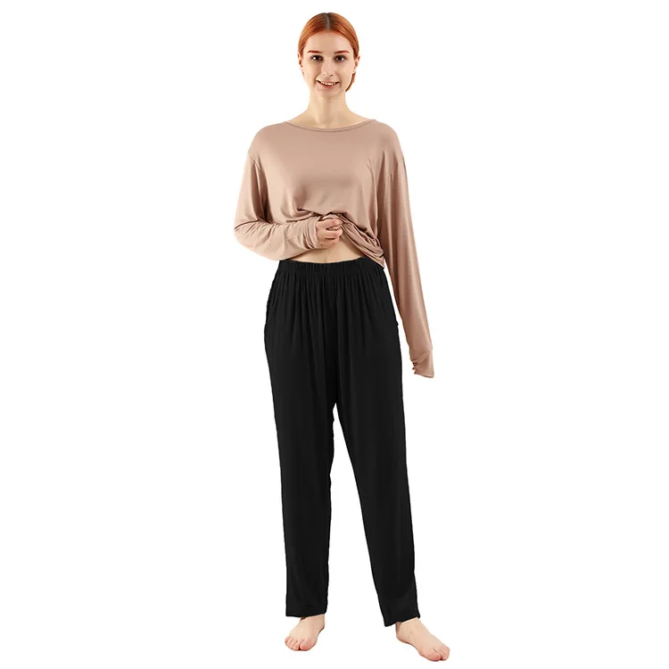 Skin-tone top + black pants