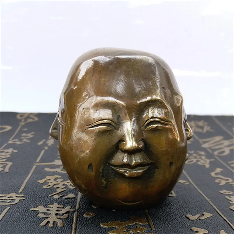 Handmade brass crafts, small four-sided head sculpture, metal figure ornament