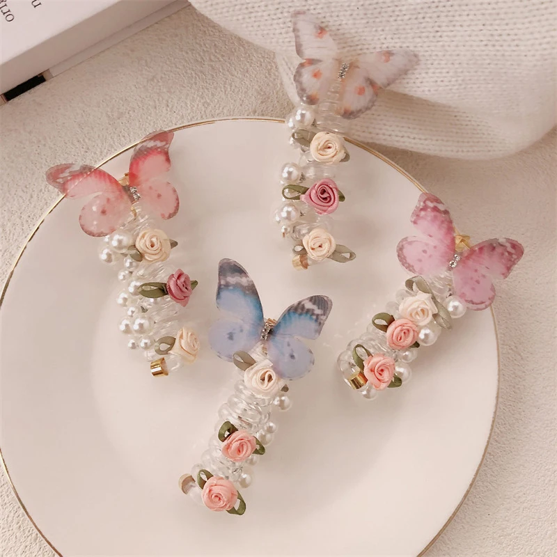 

Beautiful Set of 2 Rose Butterfly Headband; Bubble Braid; Ideal for Ponytail; Pearl Embellishment; Highly Elastic.